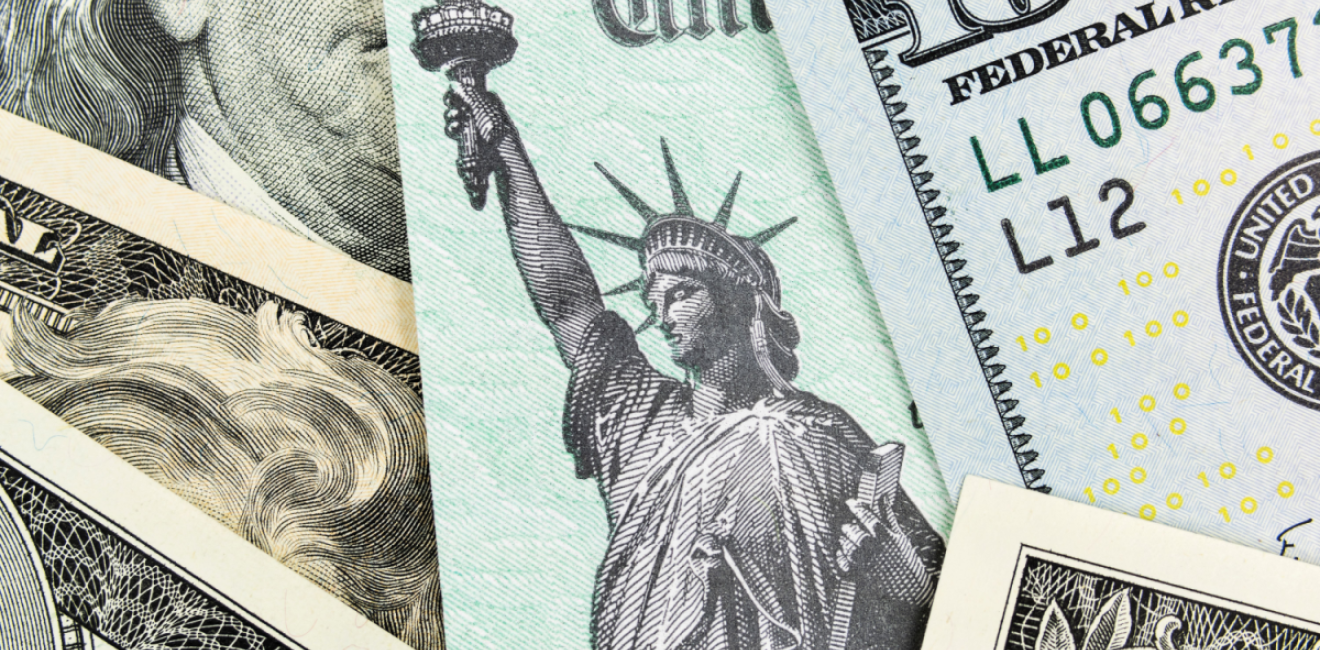 US Treasury Check with a $100 bill