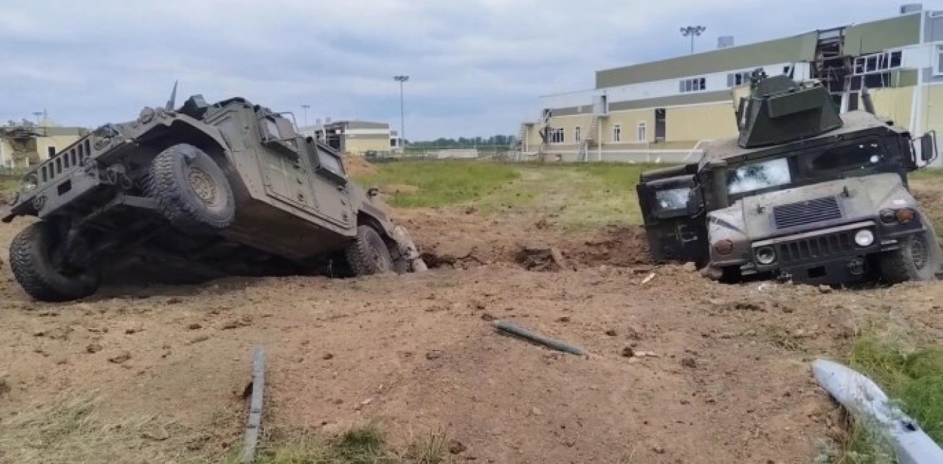 Humvees in ditch