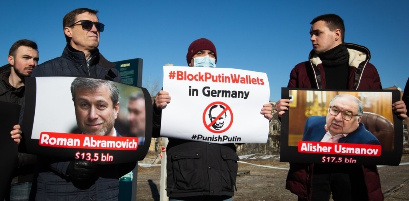 Activists holding signs