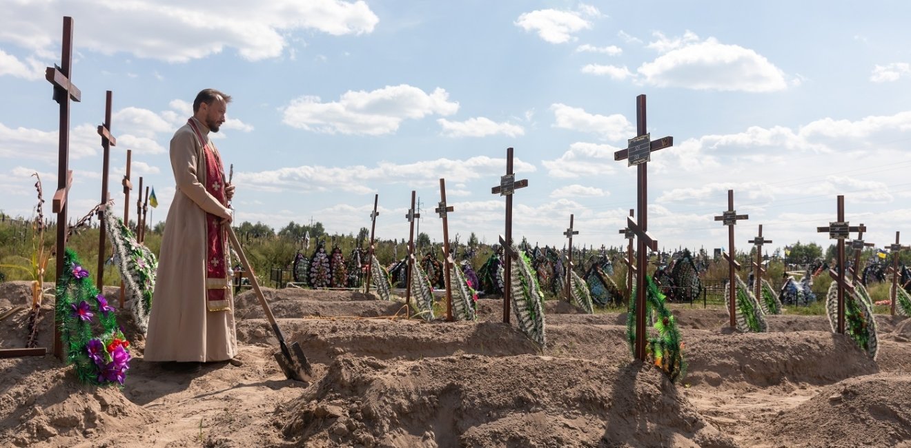 Burial of the remains of 13 unidentified and two identified people who were killed in the Bucha district during the Russian occupation