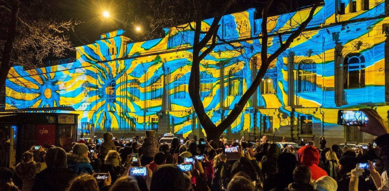 Blue and Yellow projection on a building 