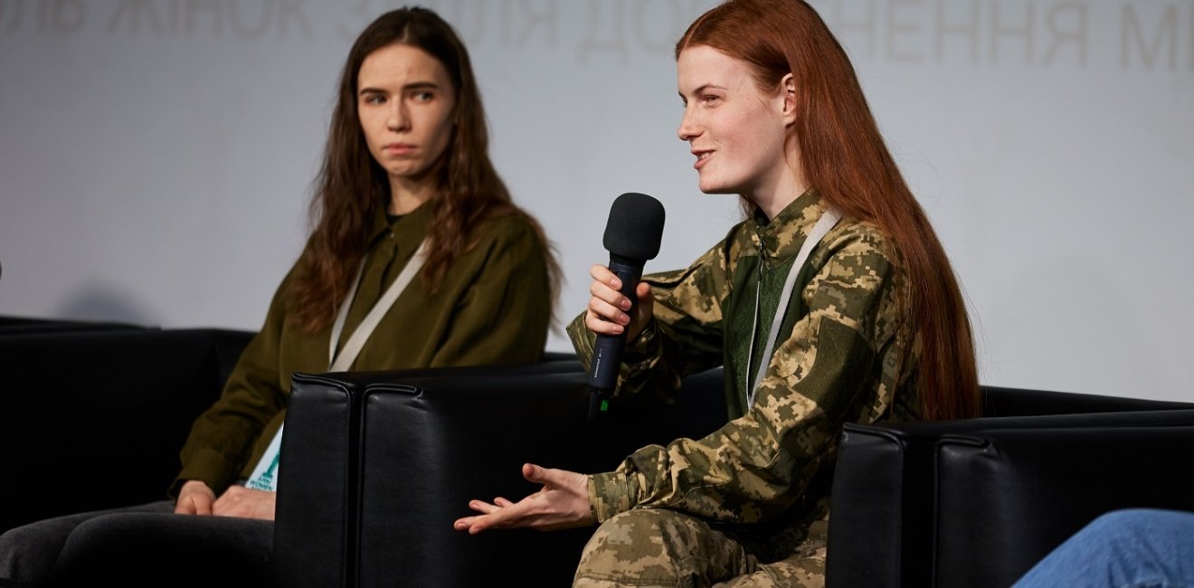 Oksana Rubaniak speaks at forum Arm Women Now in Kyiv