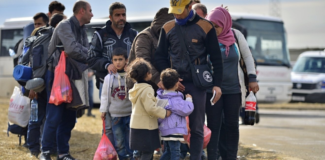 Refugees entering a refugee camp