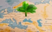 Green leaf on map sprouting from Ukraine