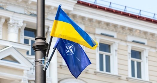 NATO and Ukraine Flags on pole