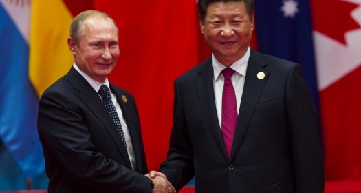HANGZHOU, CHINA - SEPT. 4. 2016 - Chinese president Xi Jinping (R) welcomes Russian President Vladimir Putin (L) in G20 summit in Hangzhou.