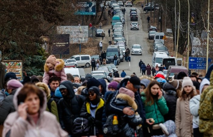 February 26, 2022: Refugees are waiting for permission to cross the border into Europe through the Ukrainian-Slovak border.
