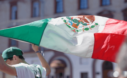 Mexican football fan with flag