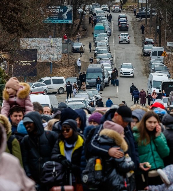February 26, 2022: Refugees are waiting for permission to cross the border into Europe through the Ukrainian-Slovak border.