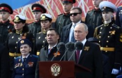 President Putin surrounded by military officers