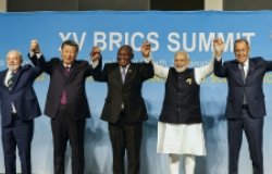  From left, Brazil's President Luiz Inacio Lula da Silva, China's President Xi Jinping, South Africa's President Cyril Ramaphosa, India's Prime Minister Narendra Modi and Russia's Foreign Minister Sergei Lavrov pose for a BRICS group photo during the 2023 BRICS Summit at the Sandton Convention Center in Johannesburg, South Africa, Wednesday, August 23, 2023. (Gianluigi Guercia/Pool via AP)