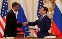 President Barack Obama and Russian President Dmitry Medvedev sign the Prague Treaty in 2010.