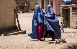Afghan women in burqas walking in the street in Kabul