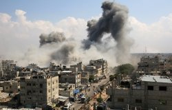 Smoke rises after Israeli air strikes of the city of Rafah in the southern Gaza Strip, October 10, 2023.